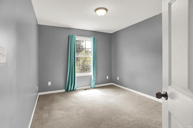 5972 N Ajuga Ct, Ellettsville, IN 47429 - unfurnished room featuring carpet flooring and baseboards
