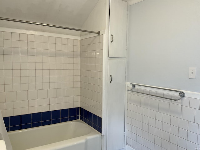 2103 Kentucky Ave, Fort Wayne, IN 46805 - full bath featuring tile walls,  shower combination, and a wainscoted wall
