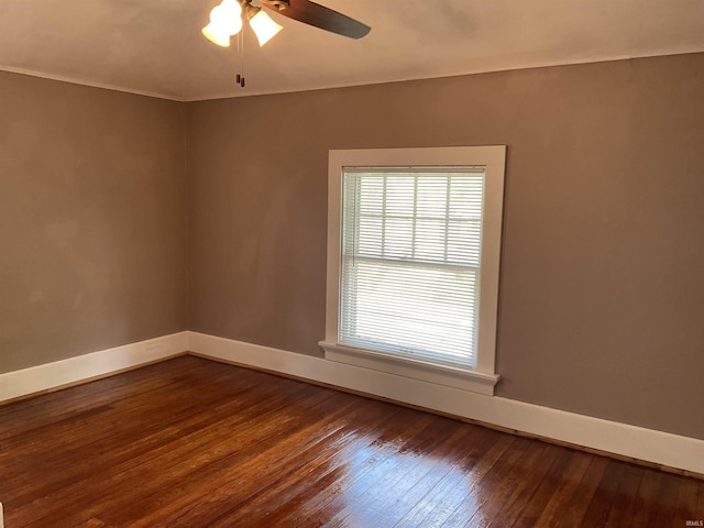 2103 Kentucky Ave, Fort Wayne, IN 46805 - empty room featuring dark wood finished floors and ceiling fan