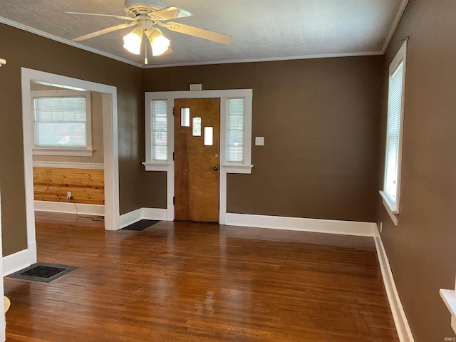 2103 Kentucky Ave, Fort Wayne, IN 46805 - entryway with wood finished floors, plenty of natural light, ornamental molding, and ceiling fan