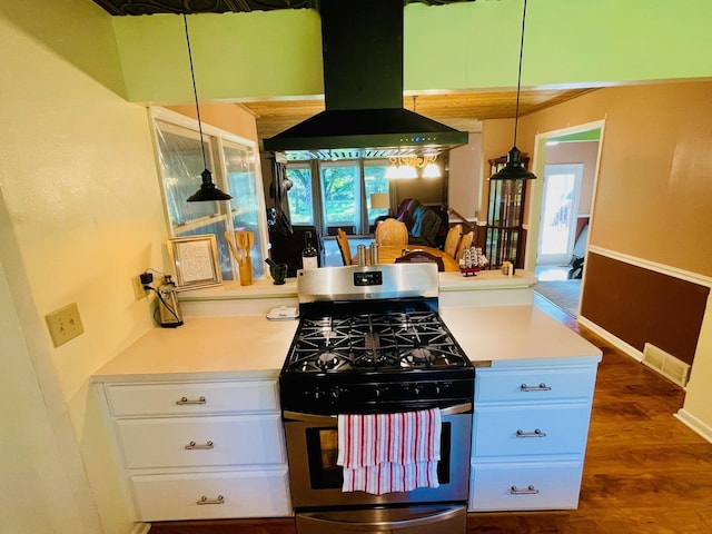 7640 Union Rd, Plymouth, IN 46563 - kitchen featuring gas range, ventilation hood, white cabinets, decorative light fixtures, and dark wood-style flooring