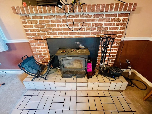 7640 Union Rd, Plymouth, IN 46563 - detailed view of a wood stove and baseboards