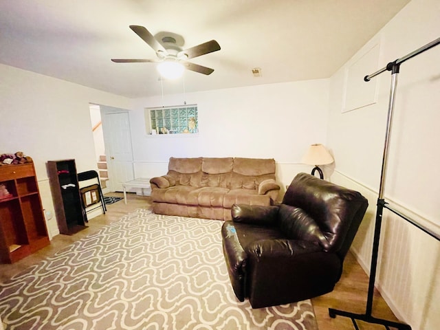 7640 Union Rd, Plymouth, IN 46563 - living area with ceiling fan and wood finished floors