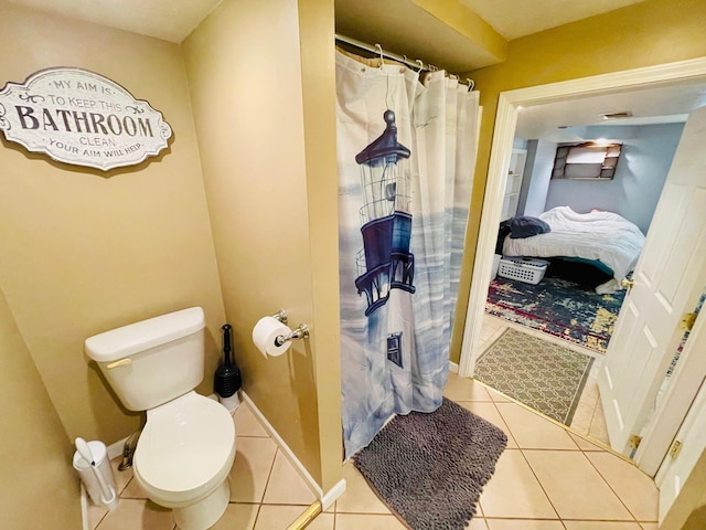 7640 Union Rd, Plymouth, IN 46563 - bathroom featuring tile patterned flooring and a shower with curtain