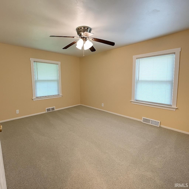 2056 Riedmiller Ave, Fort Wayne, IN 46802 - spare room featuring carpet floors and a ceiling fan