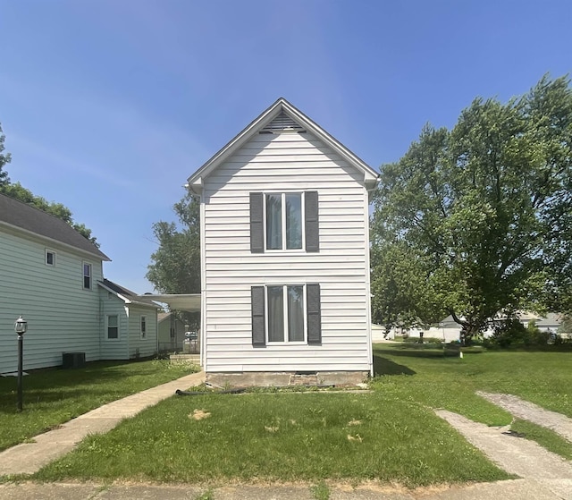 827 21st St, Logansport, IN 46947 - view of home's exterior with a yard