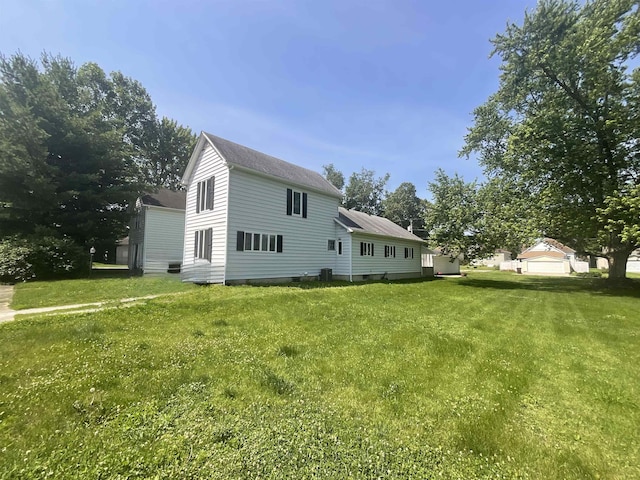 827 21st St, Logansport, IN 46947 - rear view of property with a lawn