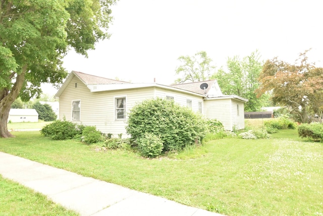 102 S Foster St, Boswell, IN 47921 - view of property exterior featuring a yard