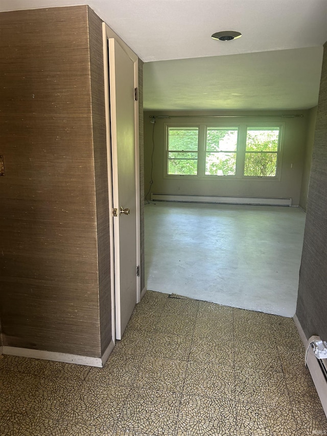 3215 Wakashan Pl, Fort Wayne, IN 46815 - hallway with plenty of natural light, baseboard heating, and a baseboard radiator