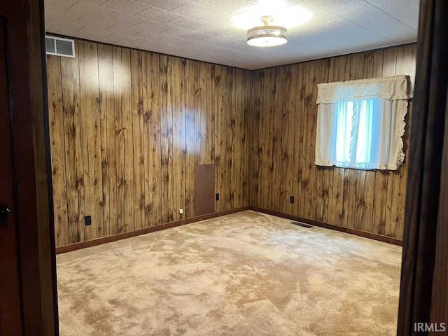 126 E Washington St, Monroe, IN 46772 - carpeted empty room with wooden walls
