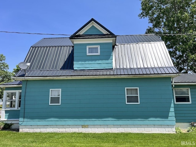 126 E Washington St, Monroe, IN 46772 - view of side of home with a metal roof