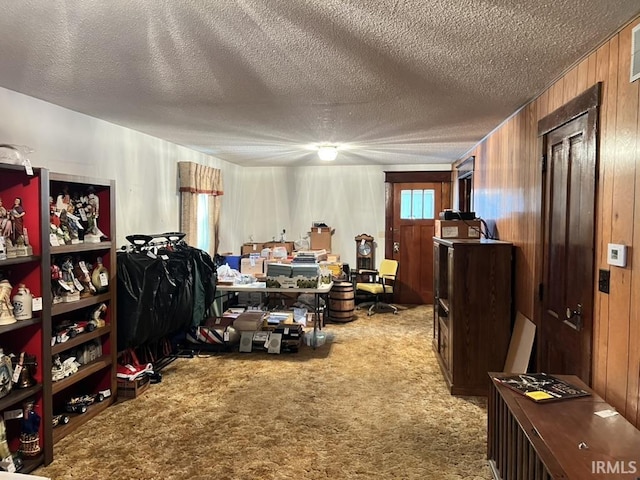 126 E Washington St, Monroe, IN 46772 - interior space with carpet floors, wooden walls, and a textured ceiling