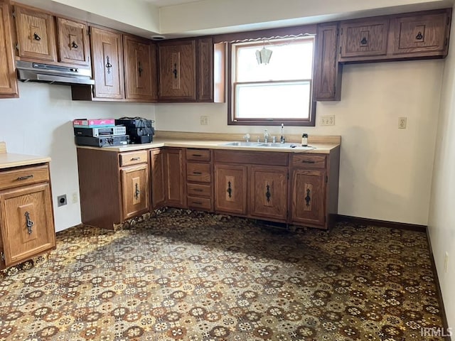 126 E Washington St, Monroe, IN 46772 - kitchen with a sink and under cabinet range hood