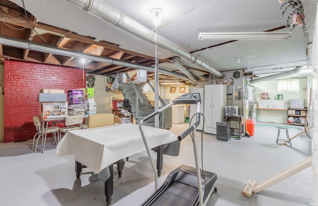 3721 Claremont Ave, Evansville, IN 47712 - below grade area featuring brick wall and stairway