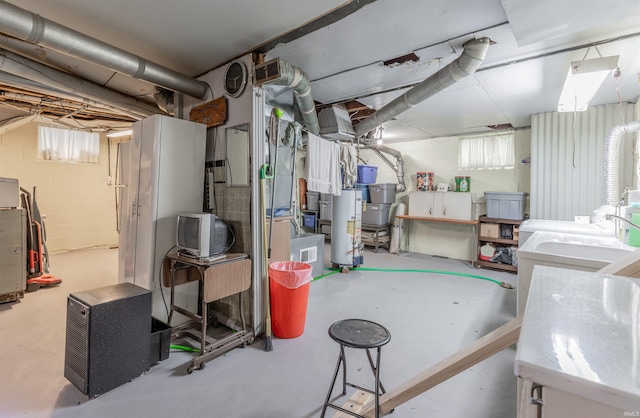 3721 Claremont Ave, Evansville, IN 47712 - basement with gas water heater and concrete block wall