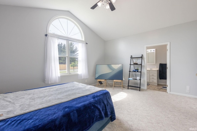 26973 Water Edge Dr, Elkhart, IN 46514 - carpeted bedroom with lofted ceiling, ensuite bathroom, and ceiling fan