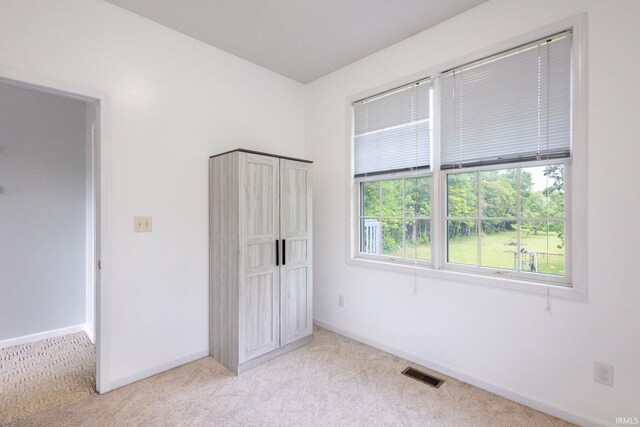 26973 Water Edge Dr, Elkhart, IN 46514 - unfurnished bedroom with light colored carpet and baseboards