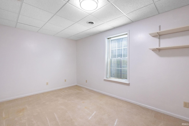 26973 Water Edge Dr, Elkhart, IN 46514 - unfurnished room featuring light colored carpet and a paneled ceiling