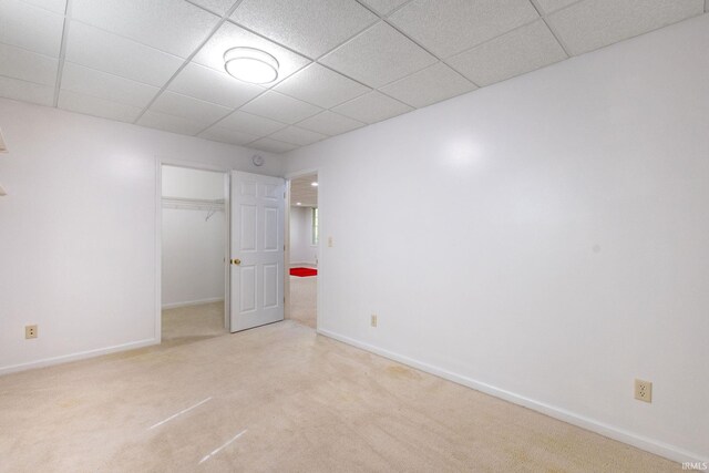 26973 Water Edge Dr, Elkhart, IN 46514 - unfurnished bedroom with a closet, a drop ceiling, and carpet floors
