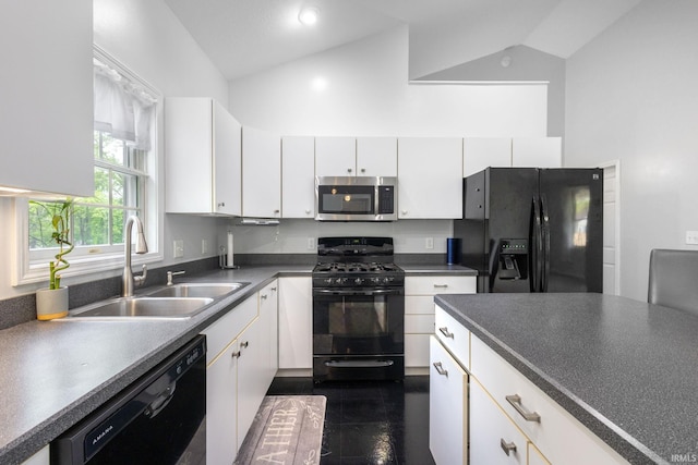 26973 Water Edge Dr, Elkhart, IN 46514 - kitchen featuring black appliances, dark countertops, white cabinetry, and high vaulted ceiling