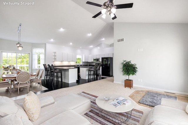 26973 Water Edge Dr, Elkhart, IN 46514 - living room featuring recessed lighting, a ceiling fan, and high vaulted ceiling
