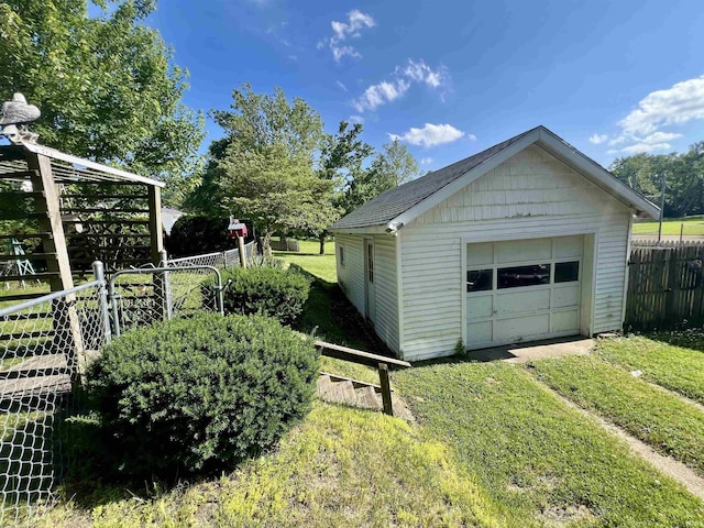 323 Simon St, Plymouth, IN 46563 - detached garage featuring driveway
