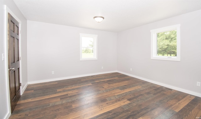 3046 Long Lake Rd, Albion, IN 46701 - spare room featuring dark wood finished floors and baseboards