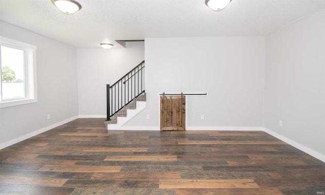 3046 Long Lake Rd, Albion, IN 46701 - empty room featuring stairway and wood finished floors