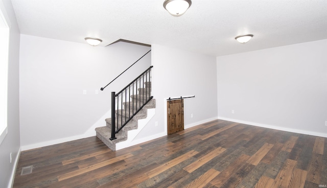 3046 Long Lake Rd, Albion, IN 46701 - unfurnished living room with wood finished floors and stairs