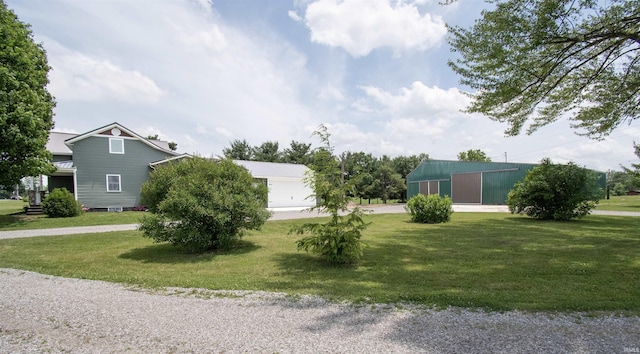 3046 Long Lake Rd, Albion, IN 46701 - view of green lawn featuring a pole building and an outdoor structure