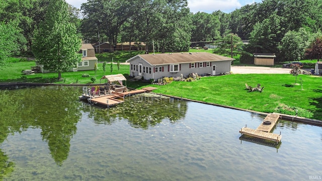 1897 Lakeshore Dr, Walkerton, IN 46574 - dock featuring a water view and a yard