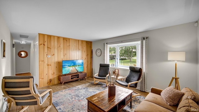 1897 Lakeshore Dr, Walkerton, IN 46574 - living room featuring wooden walls and wood finished floors