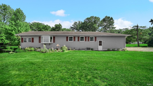 1897 Lakeshore Dr, Walkerton, IN 46574 - rear view of property with a lawn