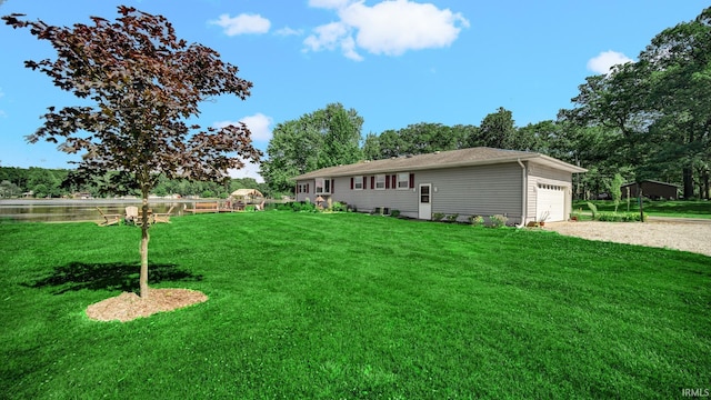 1897 Lakeshore Dr, Walkerton, IN 46574 - view of grassy yard with gravel driveway and view of scattered trees