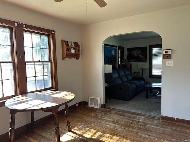 2816 E Morgan Ave, Evansville, IN 47711 - dining space featuring arched walkways, hardwood / wood-style floors, and a ceiling fan