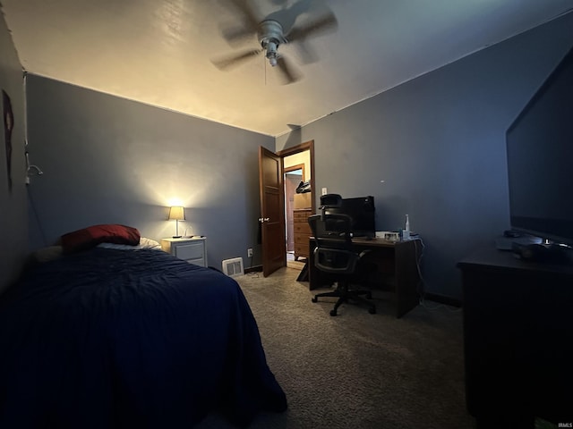 2816 E Morgan Ave, Evansville, IN 47711 - bedroom with an office area, light carpet, and a ceiling fan
