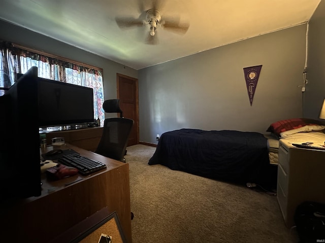 2816 E Morgan Ave, Evansville, IN 47711 - bedroom featuring light colored carpet, ceiling fan, and a desk