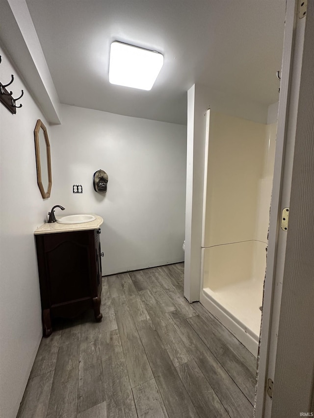 2816 E Morgan Ave, Evansville, IN 47711 - full bath with vanity, wood finished floors, and a stall shower