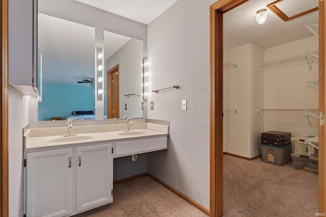 953 Handlebar Rd, Mishawaka, IN 46544 - bathroom featuring double vanity and a closet