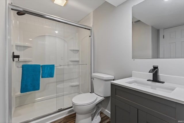 953 Handlebar Rd, Mishawaka, IN 46544 - full bath with vanity, a shower stall, and wood finished floors