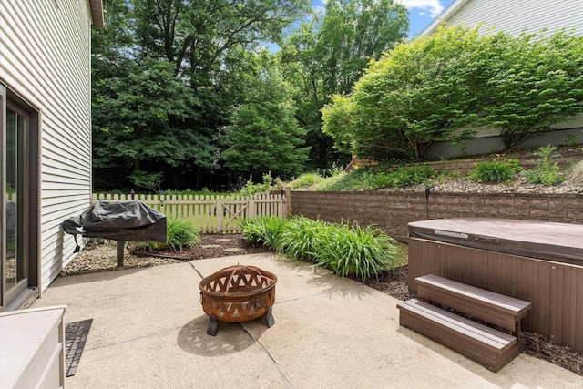 953 Handlebar Rd, Mishawaka, IN 46544 - view of patio with a fire pit, a hot tub, and area for grilling