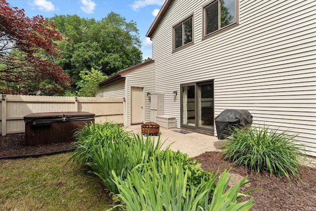 953 Handlebar Rd, Mishawaka, IN 46544 - back of property with a hot tub and a patio area
