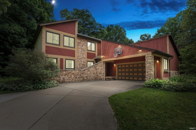 953 Handlebar Rd, Mishawaka, IN 46544 - mid-century inspired home featuring stone siding, driveway, and a garage