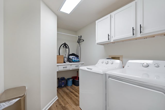 3865 E Forest Glen Ave, Leesburg, IN 46538 - laundry room with independent washer and dryer, cabinet space, and light wood-style floors