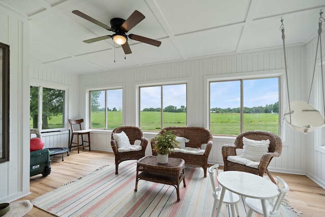 3865 E Forest Glen Ave, Leesburg, IN 46538 - sunroom with wood finished floors, coffered ceiling, a wooden deck, and a decorative wall