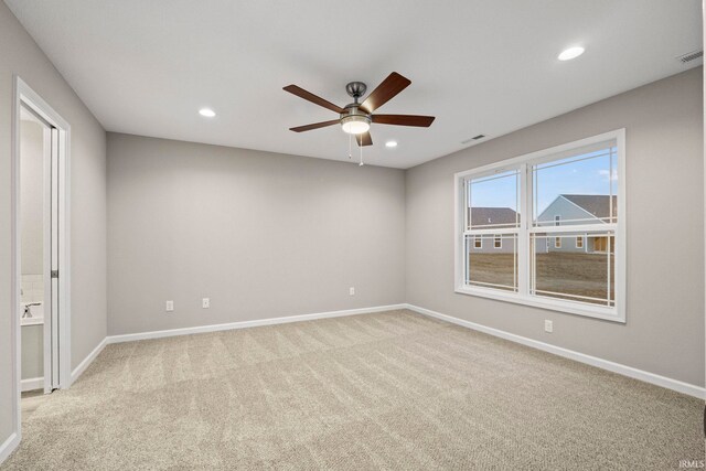 10263 Tirian Pl, Fort Wayne, IN 46835 - carpeted empty room featuring a ceiling fan and recessed lighting