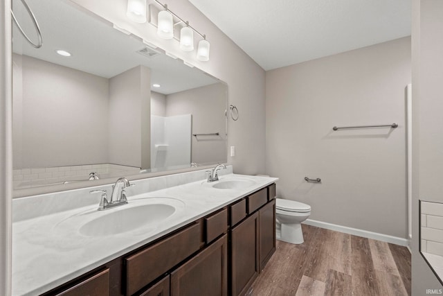 10263 Tirian Pl, Fort Wayne, IN 46835 - full bathroom with wood finished floors, double vanity, a shower, and a bathtub