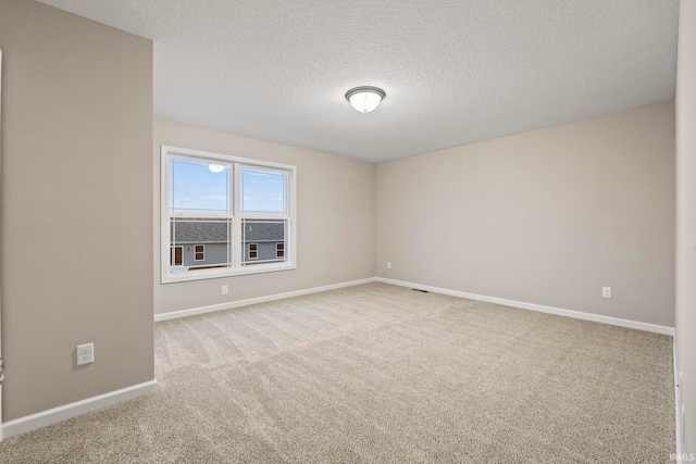 10263 Tirian Pl, Fort Wayne, IN 46835 - spare room with carpet floors and a textured ceiling