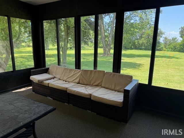 7737 N 100 E Rd, Lucerne, IN 46950 - sunroom / solarium featuring healthy amount of natural light and an outdoor living space