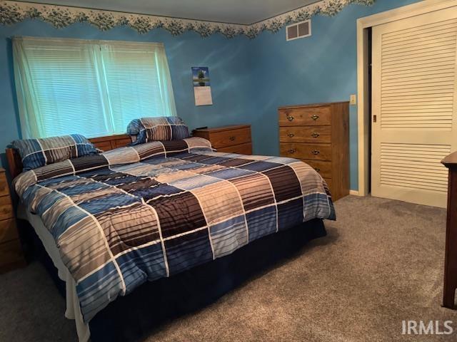7737 N 100 E Rd, Lucerne, IN 46950 - carpeted bedroom featuring a closet